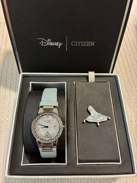 Citizen Eco-Drive Disney Cinderella Box Set features a watch with a crystal-encrusted bezel and a white mother-of-pearl dial